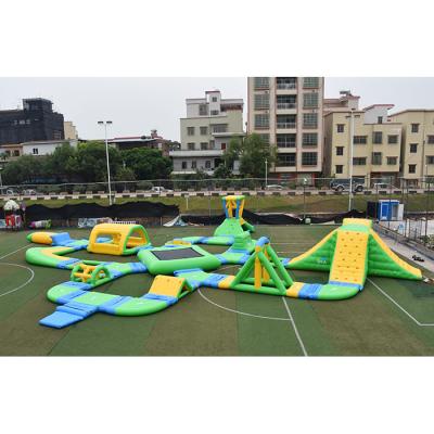 China Outdoordoor Water Fun Inflatable Water Slide Large Adult Commercial Super Giant Floating Sports Equipment for sale