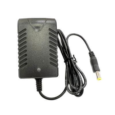 China Camera Factory Price Power Adapter 12V1A 12V2A Converter Adapter Charger Power Supply Black Fan Power Supply for sale