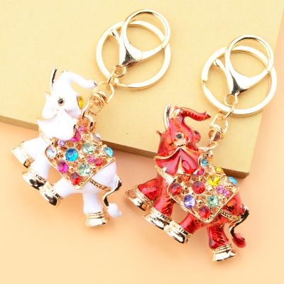 China New Arrivals Creative Environmentally Friendly Gold Plated Glitter Key Chain Girls Crystal Elephants Key Chains For Colorful Painting Animals for sale