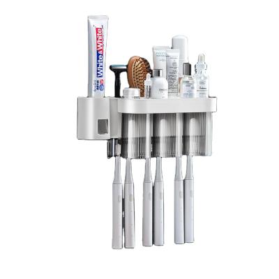 China Pinmoo ODM/OEM Sustainable Bathroom Toothbrush Dispenser Wall Mounted Toothbrush Holder Set With Storage Rack for sale