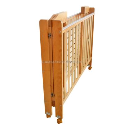 China Baby Cradle Solid Wood Solid Folding Bed With Caster for sale