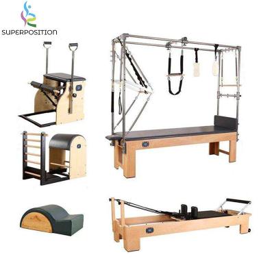 China 200kg Multi-functional custom logo wood cadillac pilates reformer machine complete set for sale