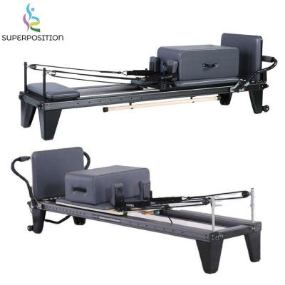 China Eco-friendly bodybuilding moving use footbar training exercise home fitness pilates aluminum reformer for sale