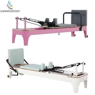 China Pilates Studio Yoga Gym Commercial Professional Home Use Wooden Pilates Reformer White Manufacturers for sale