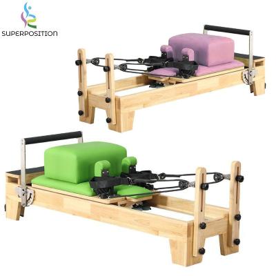 China Logo color yoga gym equipment child pilates reformer smooth sturdy smooth small size customized mini machine for sale