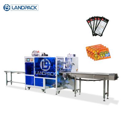 China Landpack 4 side seal hot pad warmer warm sachet packing machine for sale