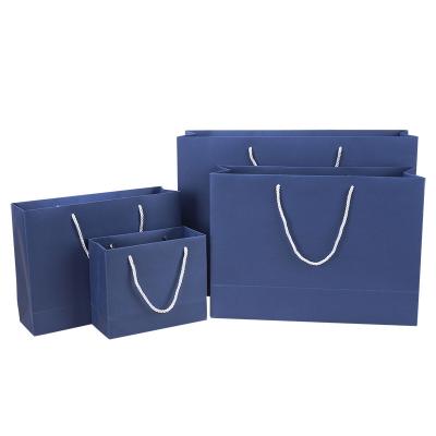 China Recyclable Promotional Paper Bag Cardboard Texture Blue Paper Shopper Bags For Perfume for sale