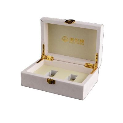 China Hot Selling Recycled Materials PU Cosmetics Metal Lock Packaging High End Leather Gift Box With EVA Inner Tray for sale