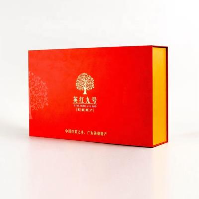 China Biodegradable luxury custom book shape knock down hard small/large top red magnetic folding paper box christmas decoration gift box eco for sale