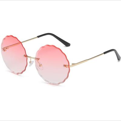 China Fashion Sunglasses Shape Polygonal Metal Cut Edge Round Rimless Piece Ocean Flower Sunglasses UV Protection Ladies Sunglasses for sale