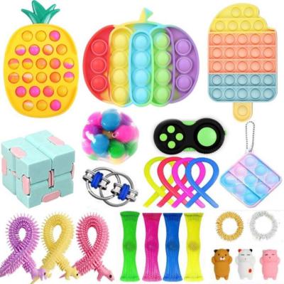 China Relax Amazon hot sale education sensory fidgety person packages push noise toys factory price DIY MIX fidgety person toys packages for sale