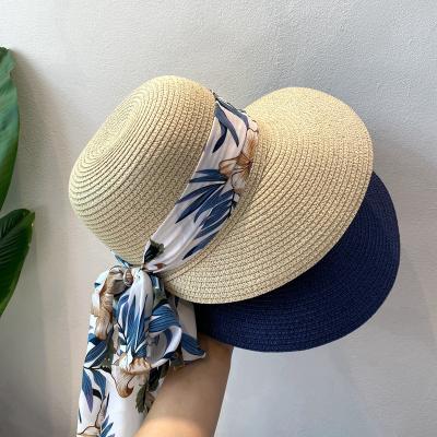 China Straw Hat Female Summer Seaside Style Shade Sunscreen Small Fresh Bohemian Vacation Play Sun Hat With Printed Big Bow for sale