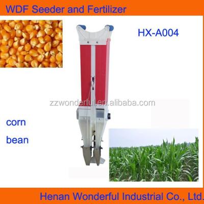 China Manual Hand Seeder Double Barrel Fertilizer and Automatic Hand Seeder for sale