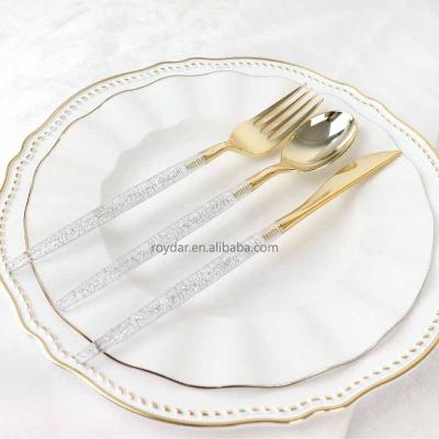 China Gold Stocked Sparkled Luxury Spoon Fork And Knife Set Flatware Plastic Wedding Event Flatware for sale