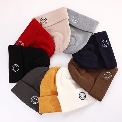 China Bsci COMMON Wholesale Custom Designer Mens Multi Color Acrylic Gorras Woven Label Logo Winter Hat Cap Skull Knitted Fisherman Beanie for sale