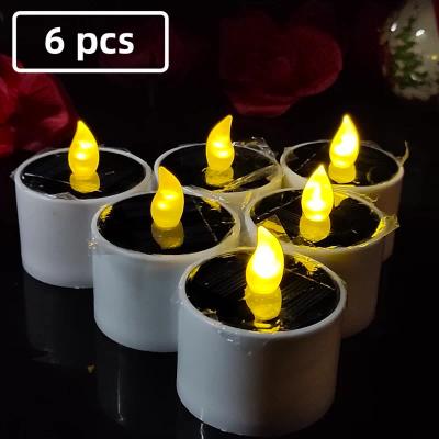 China Indoor outdoor outdoor rain proof decoration wedding tea wax diwali simulation LED solar electronic candle for sale