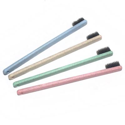 China Biodegradable Wheat Straw Toothbrush with Soft Black Charcoal Bristle Toothbrush for sale