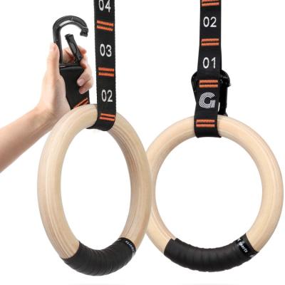 China Durable Double Circle Wooden Gymnastic Rings With Quick Adjust Numbered Straps For Full Body Workout for sale