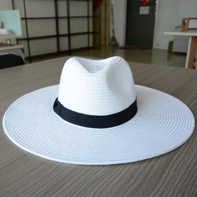 China Handwoven Crochet Woven Striped Brim Straw Hats Summer Beach Wide White Paper Women Fashion Hats for sale