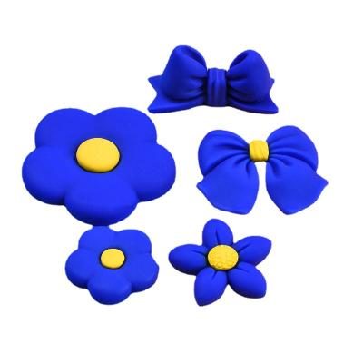 China Simple New Fashion Klein Blue Resin Flower Bowknot Serious Craft For DIY Hair Clip Phone Case Decoration for sale