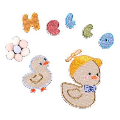 China New Viable Wholesale Cute Yellow Duck Embroidery Small Self Adhesive Patch Applique For Bag for sale