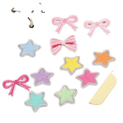 China New Viable Stock Diy Self Adhesive Cute Bowknot No Iron On Embroidery Star Patch For Clothing Bag for sale