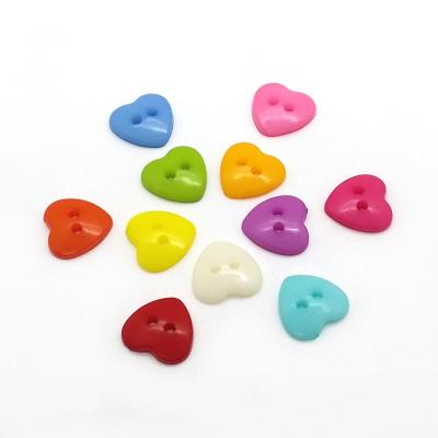 China Hotsale Sustainable Candy Colors Heart Shape 2 Hole Resin Button for sale