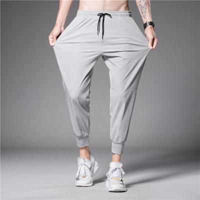 China Dropshipping Summer Men's Business Casual Pants Anti-Wrinkle Slim Pants Stretch Straight Suit Pants for sale