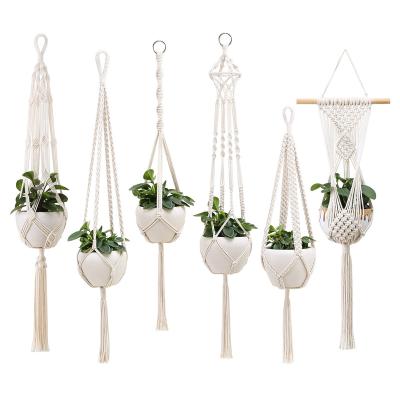 China Hot Selling Eco-Friendly Modern Plant Hangers Macrame Balcony Garden Sling Rope Plant Hangers for sale