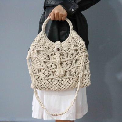 China Cotton Mesh Hollow Out Beach Bag Straw Tassel Fringe Travel Fashion Women Vacation Tote Bag for sale