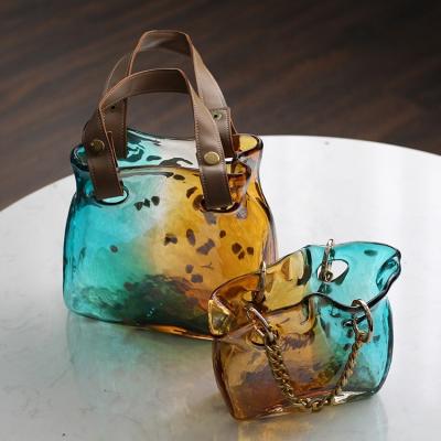 China Modern Wholesale Two Colored Luxury Art Glass Handbag Flower Vase Home Decor Wedding Decoration for sale