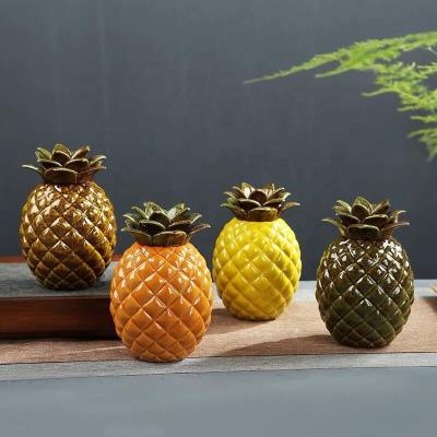 China Colorful Steamable Pineapple Shape Ceramic Tea and Coffee Canister Storage Jar for Home Decor Kitchen Accessories for sale