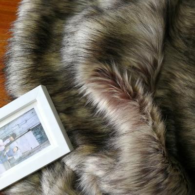 China Upholstery 100% Camouflage Auto Acrylic Short Hair Rabbit Skin Faux Faux Fur Luxurious Fabric For Muffler And Vest for sale