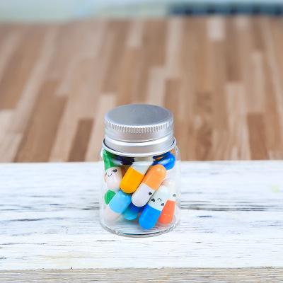 China Personal Care Customized Clear Glass Tube Type Safety Medicine Food Storage Jar Glass Bottle With Metal Tall Lid for sale