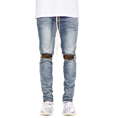 China Drawstring jeans men's jeans men's skinny ripped hole European and American fashion slim fit breathable for sale