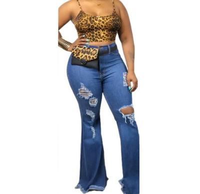 China Big Size 5XL Oversized Slim Stretch Hole Fashion Flare Pants Wholesale Plus Denim Bell-Based Jeans For Women for sale