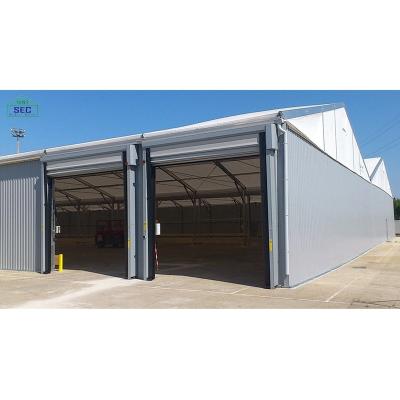 China Reinforced 6061 Aluminum Alloy Industrial Storage Logistics Warehouse Tent With Sandwich Wall for sale