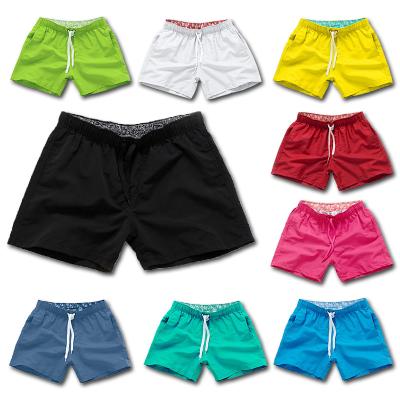 China Anti-Wrinkle Fashion Custom Summer Elastic Waist Beach Shorts Polyester Pocket Jogging 5 Inch Beach Surf Swim Inseam Quick Dry Shorts For Men for sale