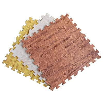 China Eco-friendly Thick Heavy Wooden Effect EVA Foam Floor Mat Gym Yoga Exercise Game Tiles Mats for sale