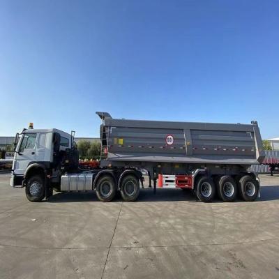 China 80 Tons Hydraulic Side Box Tipper Dumper Dump Semi Truck Trailer for Nigeria Jost E100 for sale