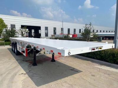 China 1840 mm loopvlak zware vier-assige platbed trailer voor veilig containervervoer Te koop