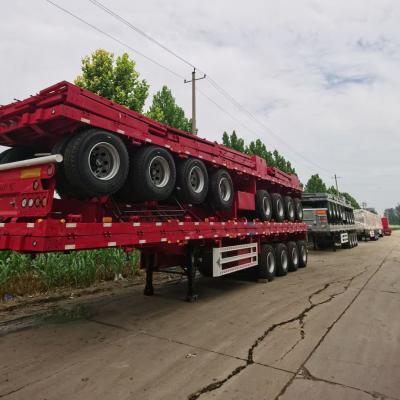 China 60 t-70 t Capacidade de carga 4 eixos Container Semi-remolque de banco plano para transporte marítimo à venda