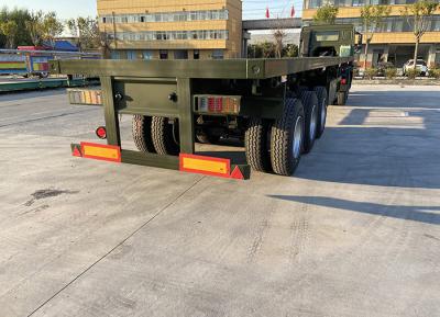 China Jost Kingpin 50T Ladekapazität Semi-Flachbett Anhänger AND9400 für den Transport von Schwerlastfahrzeugen zu verkaufen