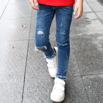 China Girls Anti-Wrinkle Fabric Breathable Denim Pants Fashionable Hole Tassel Jeans Pants for sale