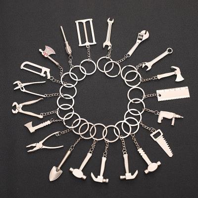 China Metal Keychains for Men Portable Car Bag Keychain Combination Tool Mini Utility Pocket Clasp Ruler Hammer Wrench Pliers Shovel for sale