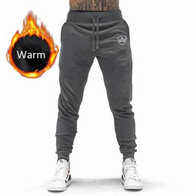 China 2022 Hot New Arrival Sustainable Cotton Shear Mens Jogger Pants Fashions Mid Waist Mens Casual Pants And Gym Pants for sale