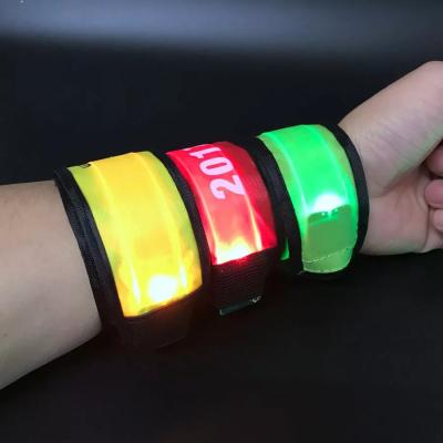 China Led Current Lights Glow Slap Band Flasher Armband For Running Reflective Led Slap Armband Party Custom Made for sale