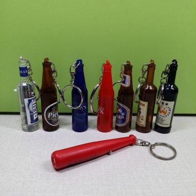 China Hot Selling Custom Key Chain Key Chain Gift ABS+metal Projection Logo LED Wine Bottle Shape LED Spotlight Promotional Key Chain for sale