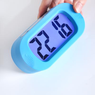 China LUMINOVA Sunrise Alarm Clock Nap Learning Digital LCD Silicon Table Alarm Clock for sale