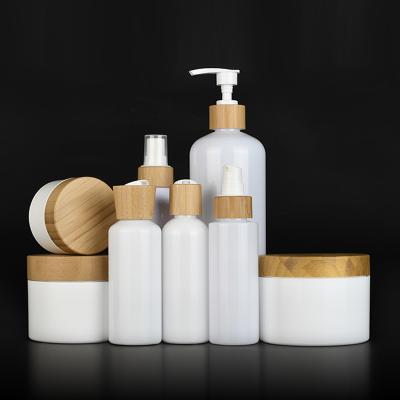 China 100ml 150ml 250ml 500ml 8oz plastic shampoo cosmetic pet body container packaging bottle with bamboo lid for sale